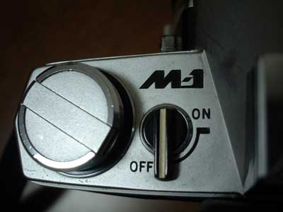 M-1
